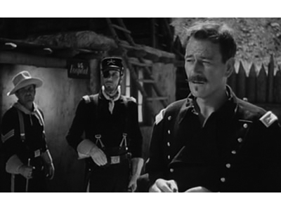Col. Peter Ortiz (w/ patch) with John Wayne in John Ford's classic <i>Rio Grande</i> (1950)
